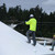 Ames Premium Roof Armor® being sprayed on rolled roof