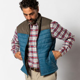 Man wearing Tom Beckbe Ridgeland Performance Vest men’s vest front view| color: Teal| C. Field & Roe | Dublin, Ohio