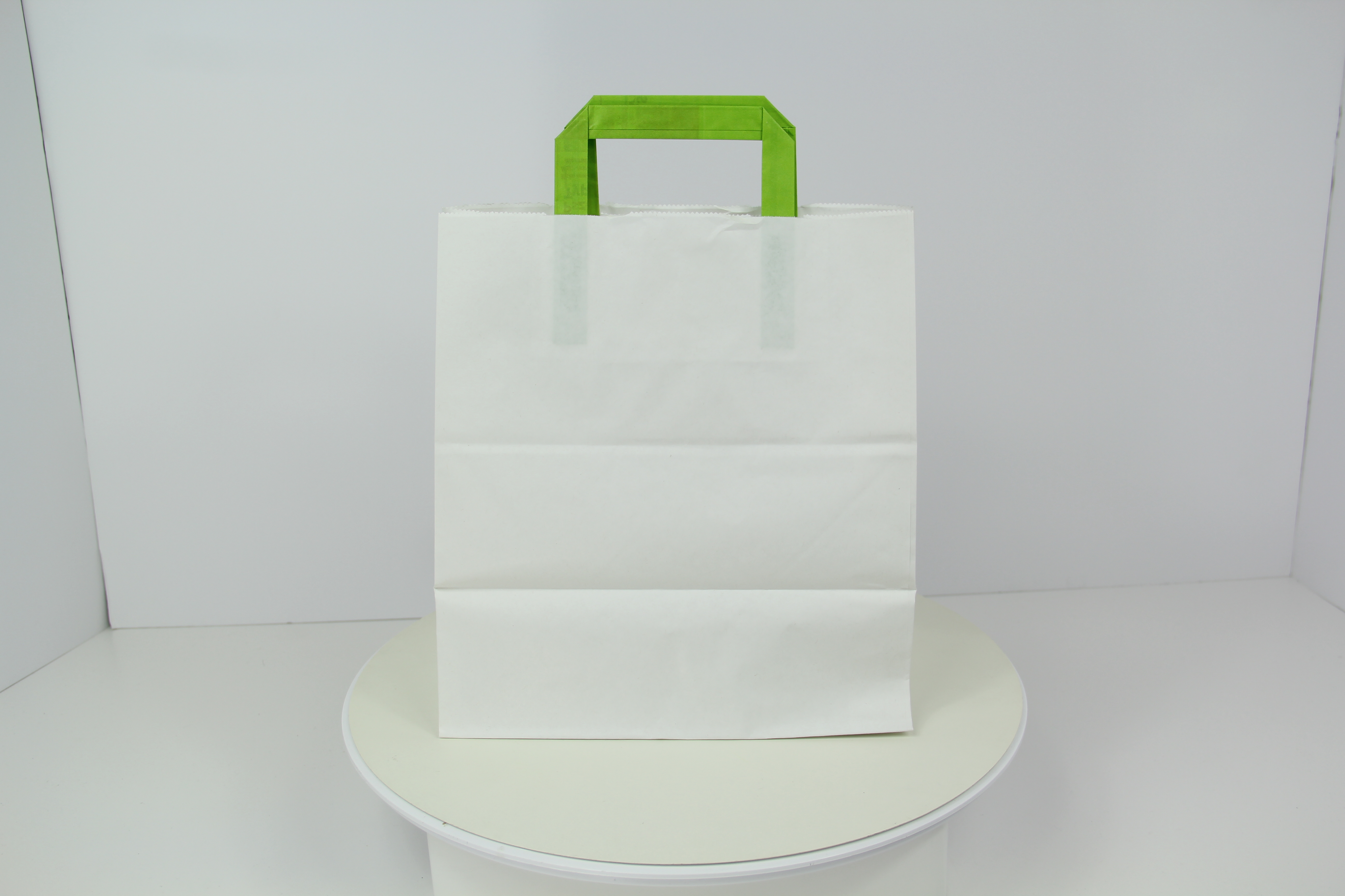 White Paper Bag with Green Handles W:10.3in Gusset:6.6in H