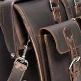 High quality front pocket of a dark brown leather briefcase upclose for lawyers.