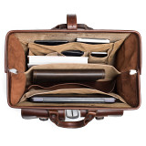 High quality red brown leather lawyers briefcase from the top view when it is wide open.