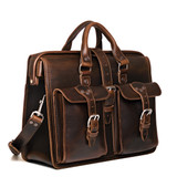 High quality dark brown flight bag leather briefcase at an angle to show the sizing better. Made by Saddleback