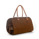 High quality light tan leather log carrier made by Saddleback