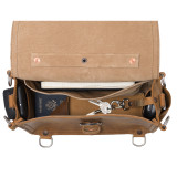This is the top open view of a tan brown rounded leather satchel.