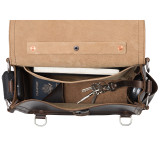 High quality top open view of a dark brown rounded leather satchel.