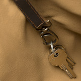 High quality key clip view of the leather all in one backpack in dark coffee