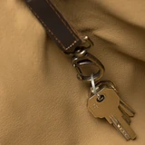 High quality key clip view of the leather all in one backpack in dark coffee