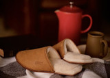 High quality tan full grain leather Dave's Deals Women's Sheepskin Slippers - Old Design - Size 6 - Tobacco side view - Saddleback Leather