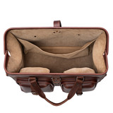 High quality opened and empty top view of Saddleback Leather's Deep Pocket Leather Duffle Bag in Red Brown / red brown