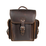 Brown leather backpack with side pockets by Saddleback.