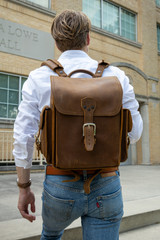 Saddleback Club Membership Backpack in Tobacco on model