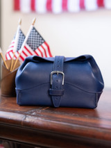 This is the rolled toilitry bag in lifestyle image