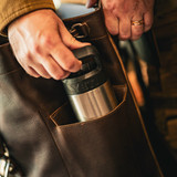 High quality tan full grain leather 16" Drawstring Backpack detail view - Saddleback Leather