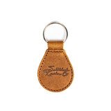 High quality front side of the tan colored leather keychain with the Saddleback logo on it