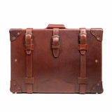 High quality front profile of the red brown medium suitcase in the grandfather collection. Made by Saddleback