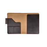 Inside of the empty dark coffee brown colored leather journal cover that has 1 medium pocket, 2 small pockets, a pen holder, and a place to hold your journal. Made by Saddleback
