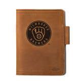 High quality tan colored leather journal cover with the Milwaukee Brewers logo on the front. Made by Saddleback