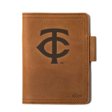 High quality tan colored leather journal cover with the Minnesota Twins logo on the cover. Made by Saddleback
