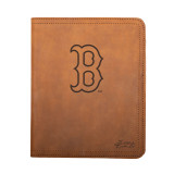 High quality tan colored leather portfolio cover with the Boston Red Sox logo on it, made by Saddleback