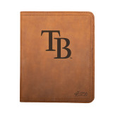 High quality tan colored leather portfolio with the Tampa Bay Rays logo on the front. Made by Saddleback
