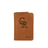 High quality tan colored leather business card holder with the Colorado Rockies logo on it, made by Saddleback