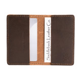 High quality inside of the dark brown colored leather business card holder with 2 slots that are holding cards. Made by Saddleback