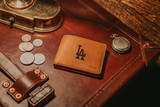 High quality saddleback Leather bifold wallet with the Los Angeles Dodgers logo.
