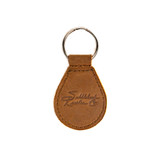 High quality back of the tan leather keychain with the Saddleback logo on this side and the Boston Red Sox logo on the front