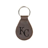 High quality dark brown colored leather keychain with the Kansas City Royals logo on the front. Made by Saddleback