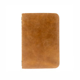 High quality front of the tan colored leather pocket notebook. Made by Saddleback