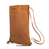 This is the flat drawstring backpack in tobacco. Made by Saddleback