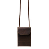 High quality front of the dark brown leather walker's pouch with a flap to keep closed. Made by Saddleback