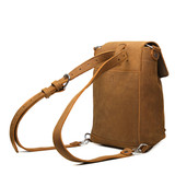 High quality the side view of the tan colored 10" tumbled drawstring leather backpack. Made by Saddleback