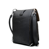 High quality the back of the black 10" tumbled drawstring leather backpack with a loop to adjust the straps. Made by Saddleback