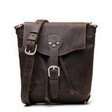 High quality the front of the 10" tumbled drawstring leather backpack in the color dark brown. Made by Saddleback