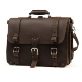High quality dark brown full grain leather briefcase with a flap over the front.