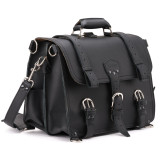 This is a black full grain leather briefcase with two belt straps that come off.