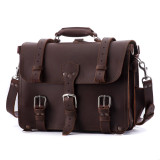 High quality front view of a large red brown full grain leather briefcase that is a classic one.