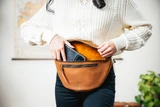 High quality model shot of the tan fanny leather bag