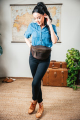High quality model shot of the dark coffee fanny leather bag