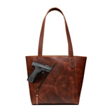 High quality the view of a gun inside our red brown conceal carry leather tote