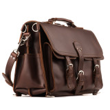 This is a 17 inch wide red brown leather briefcase with two pockets on the front and one pocket on each side.