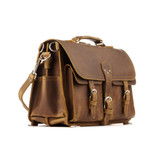 High quality brown leather briefcase that has front pockets and his big.