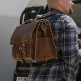 High quality leather briefcase used as a laptop backpack.