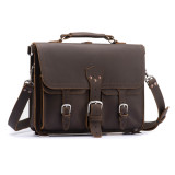 This is a dark brown leather briefcase with three buckles on the front.