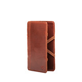 High quality the front of the red brown large leather magic wallet. Made by Saddleback