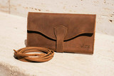 High quality the On The Go Wallet for women with the removable strap by Saddleback Leather.
