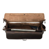 High quality interior of a dark brown slim leather briefcase with a light tan suede interior.