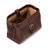 High quality red brown leather toiletry bag on the top side.