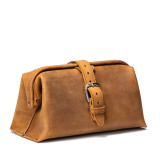 High quality tan brown leather toiletry bag on the front side.